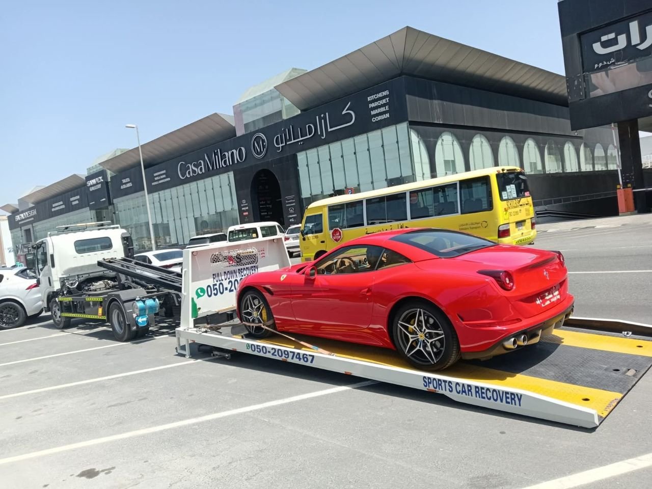 Ahmed Car Recovery flatbed recovery truck at work in Dubai — real job photo 01