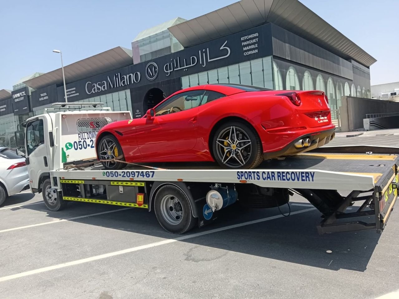 Ahmed Car Recovery flatbed recovery truck at work in Dubai — real job photo 06