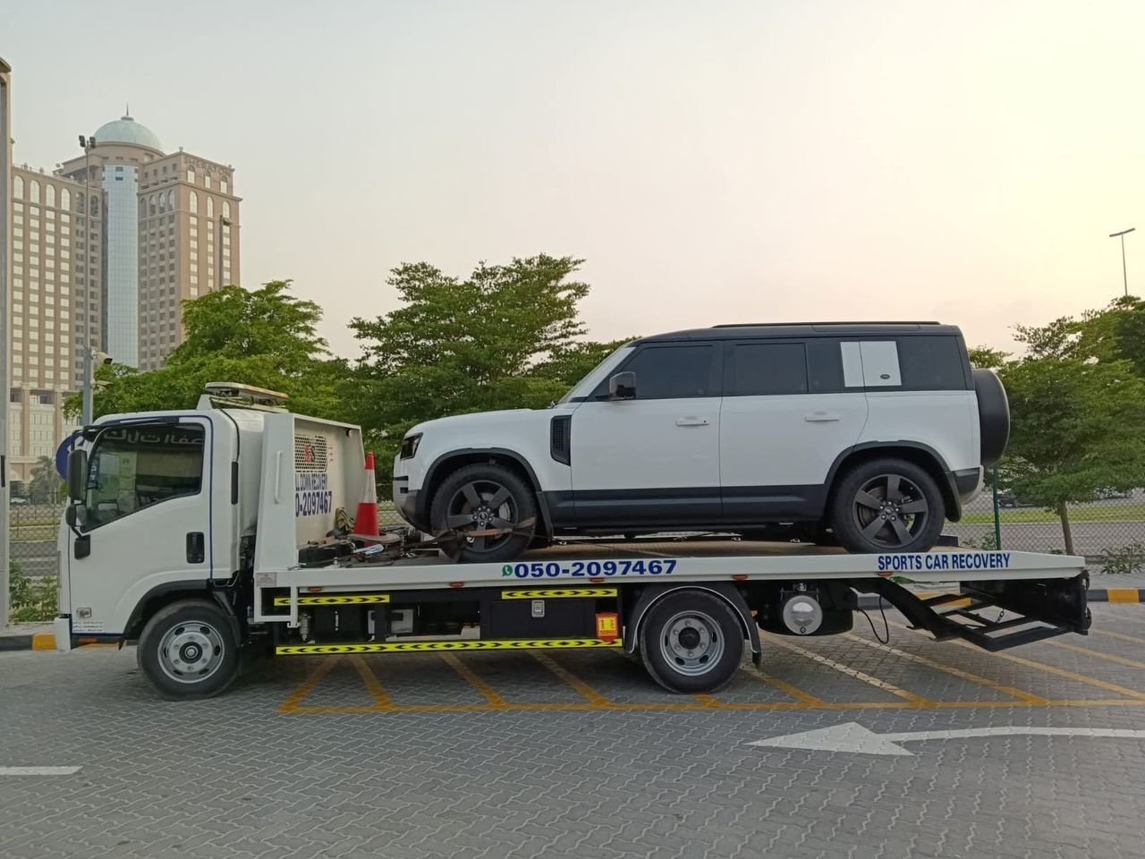 Ahmed Car Recovery flatbed recovery truck at work in Dubai — real job photo 10