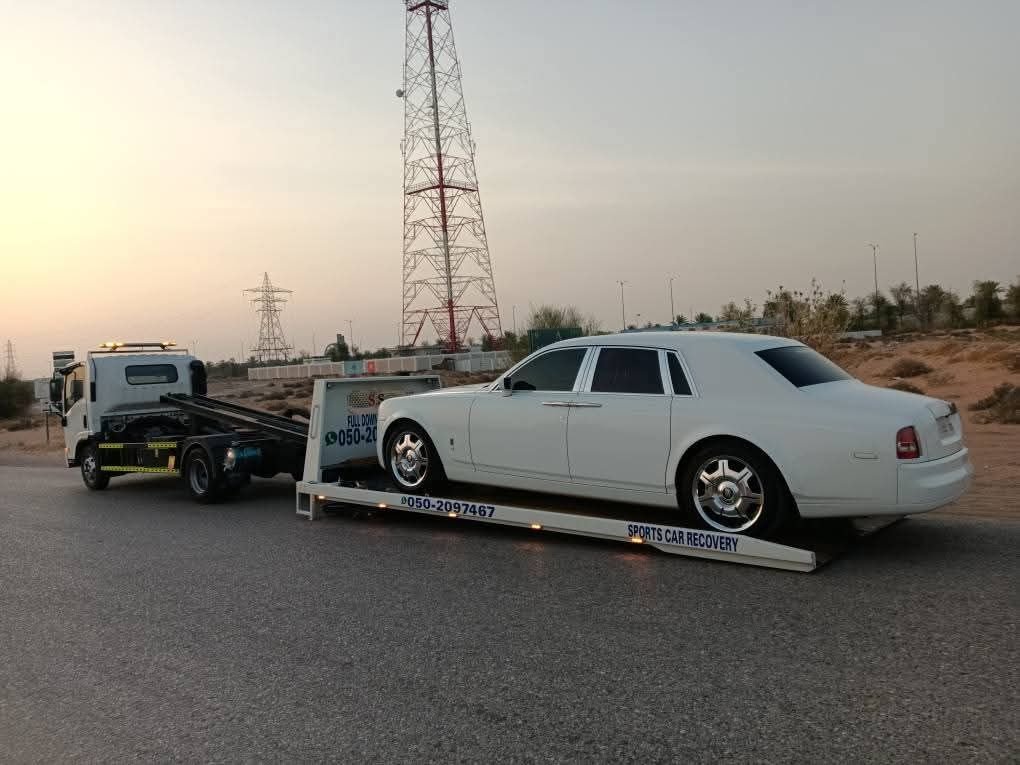 Ahmed Car Recovery flatbed recovery truck at work in Dubai — real job photo 21