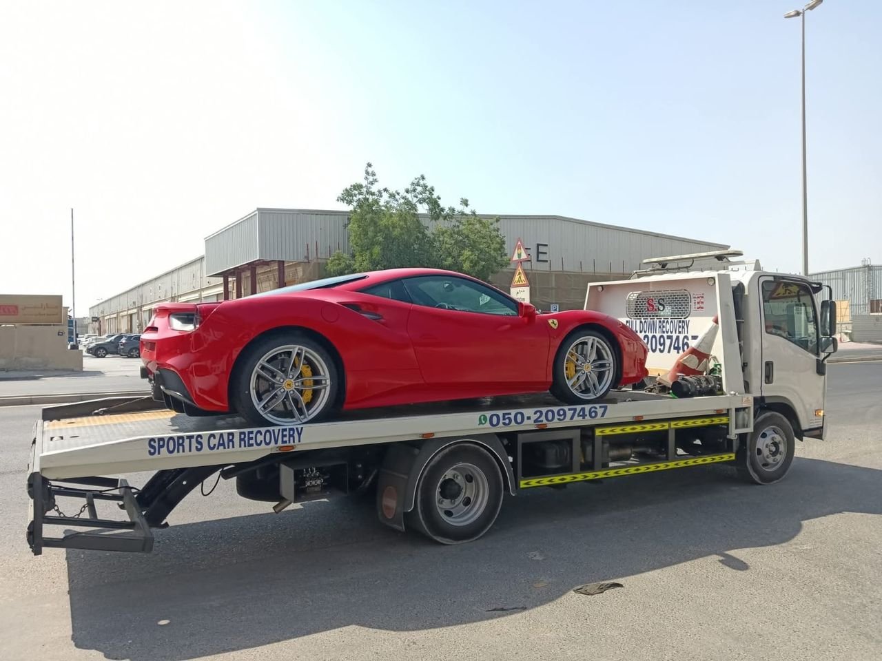Ahmed Car Recovery flatbed recovery truck at work in Dubai — real job photo 22