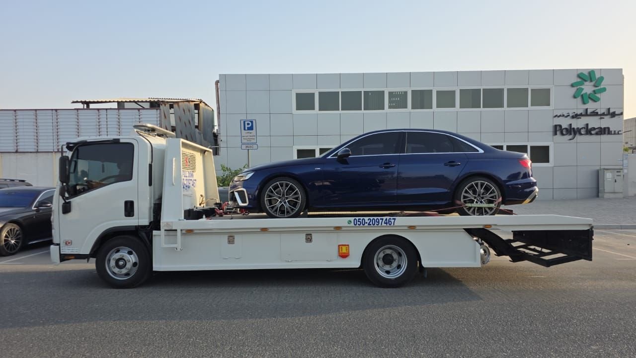 Ahmed Car Recovery flatbed recovery truck at work in Dubai — real job photo 31