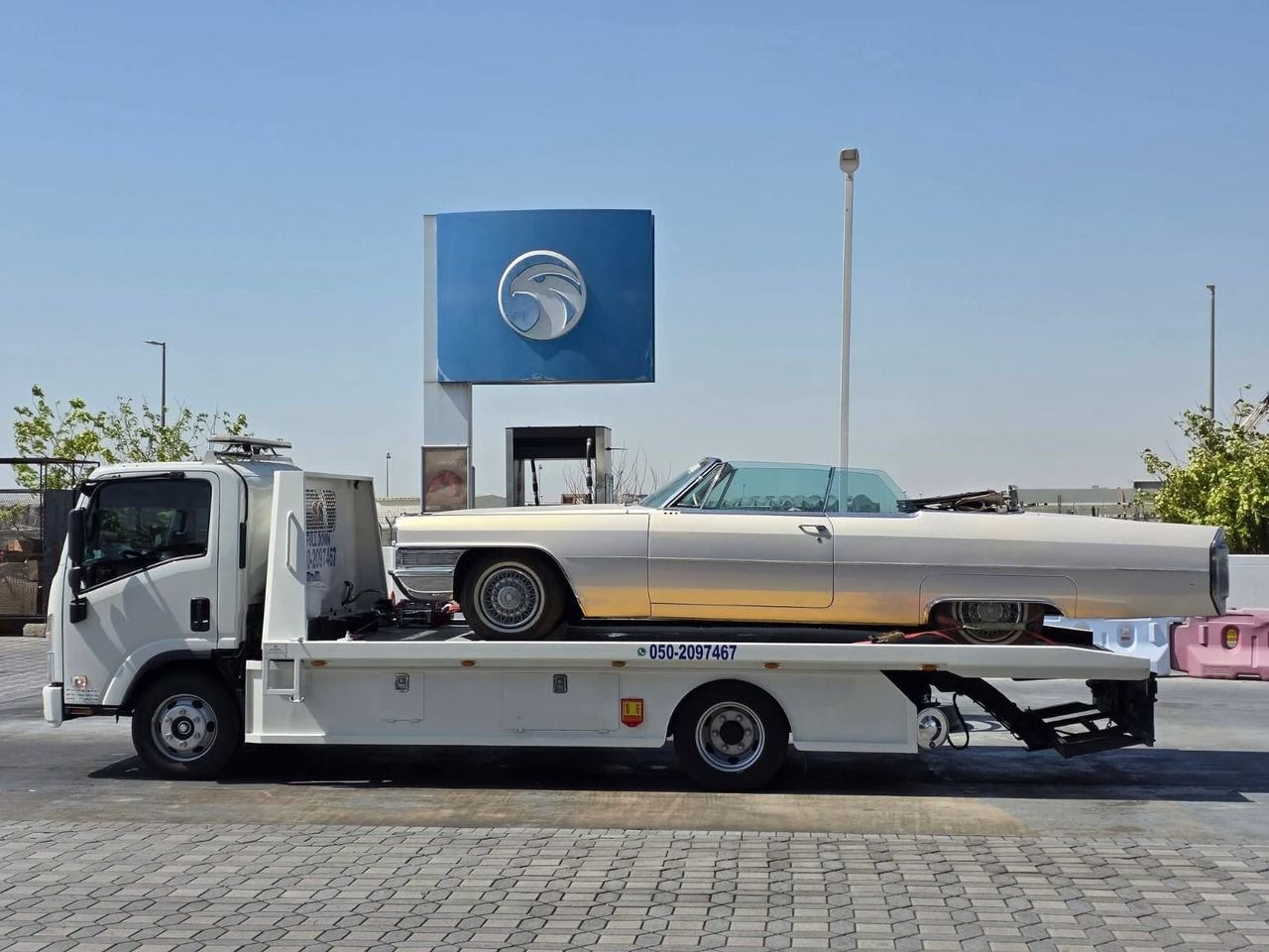 Ahmed Car Recovery flatbed recovery truck at work in Dubai — real job photo 34