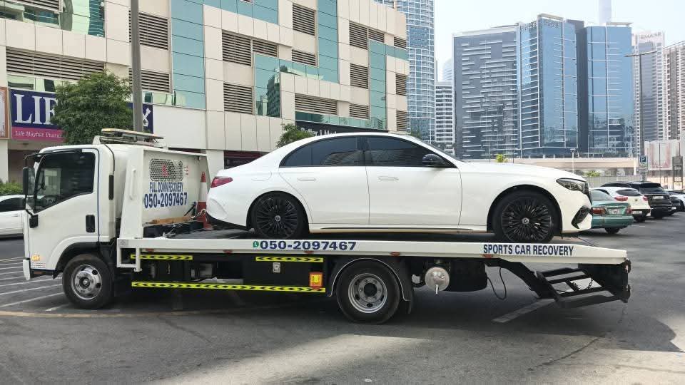 Flatbed towing Dubai — SUV residential