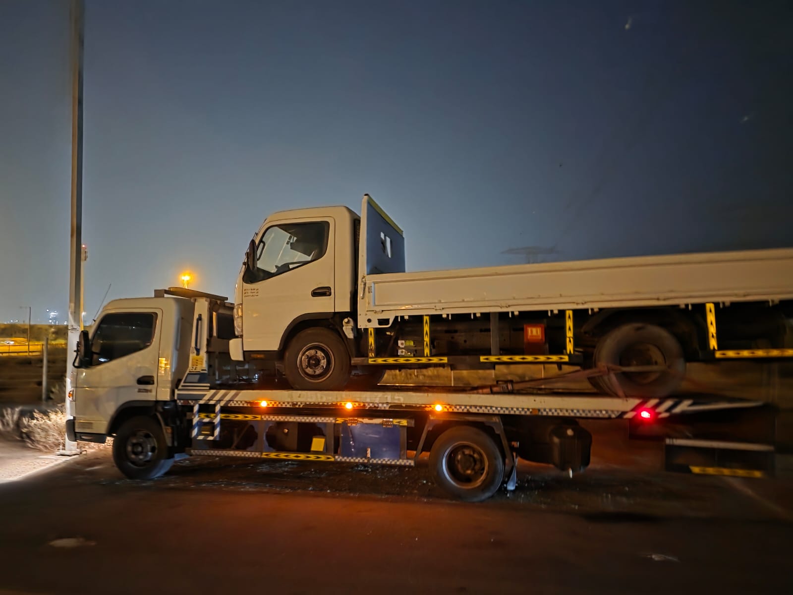 Flatbed towing Dubai — truck front view
